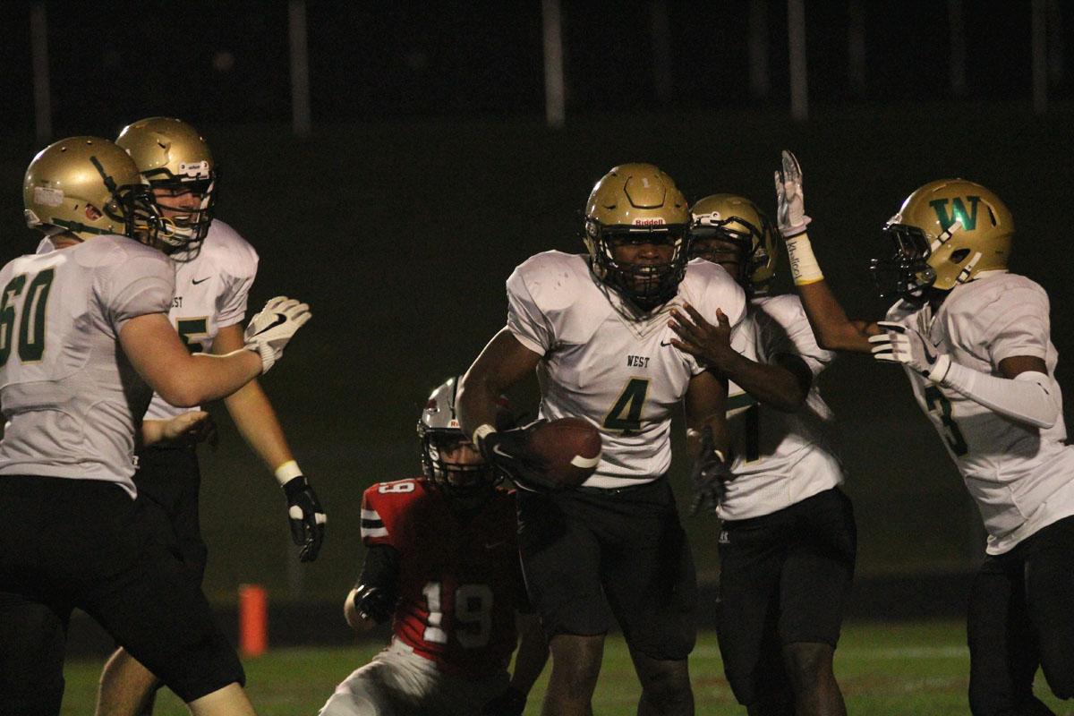 Dylan Miene '18 celebrates after he scored the last touchdown of the game on Friday, Sep. 15.