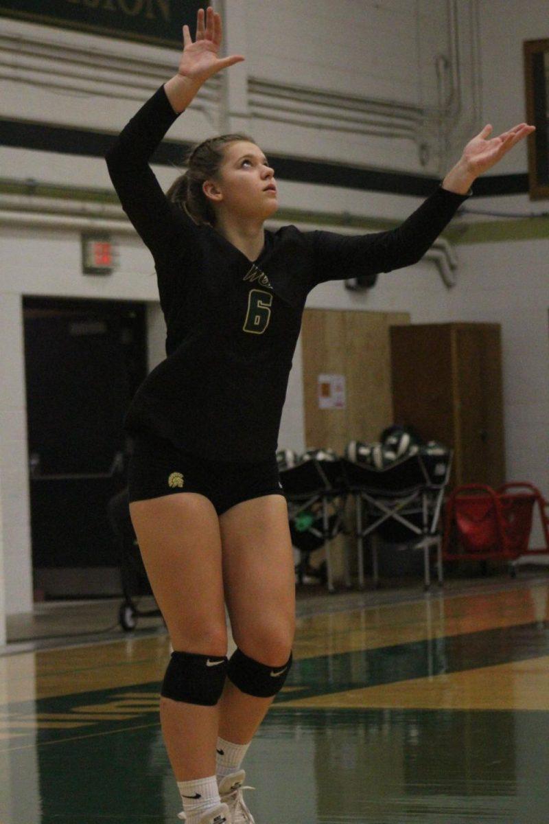 Rylee Fay '20 serves the volleyball to Jefferson on Tuesday, Sep. 26 during her sophomore season. Fay compete for the Women of Troy until her junior year before transferring to Liberty for her senior season.