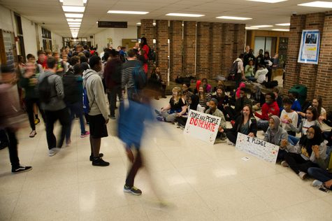 Alyson Kuennen is one of 10 finalists nationwide in NSPAs News Photo of the Year contest for this photo taken at a sit-in protest in the West High Commons in November 2016. 