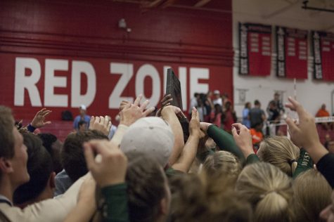The Spike makes its way through the triumphant hands of the girls varsity volleyball team and the student section that cheered them on after their win against City High on Sept. 5 for the third consecutive year. 