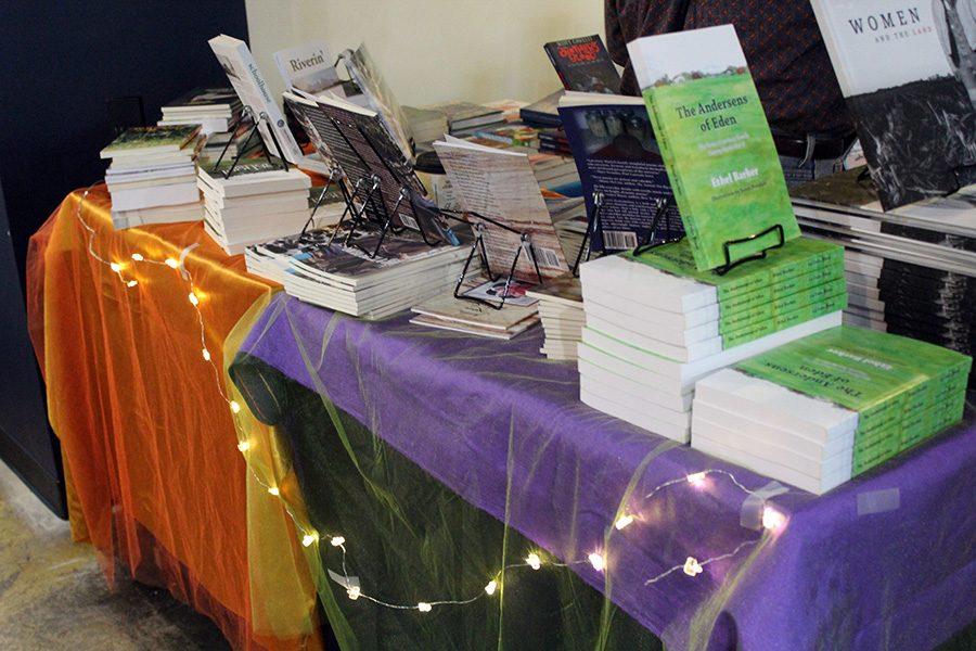 A display at the Book Festival is made unique from the others by the row of lights hanging from the table.