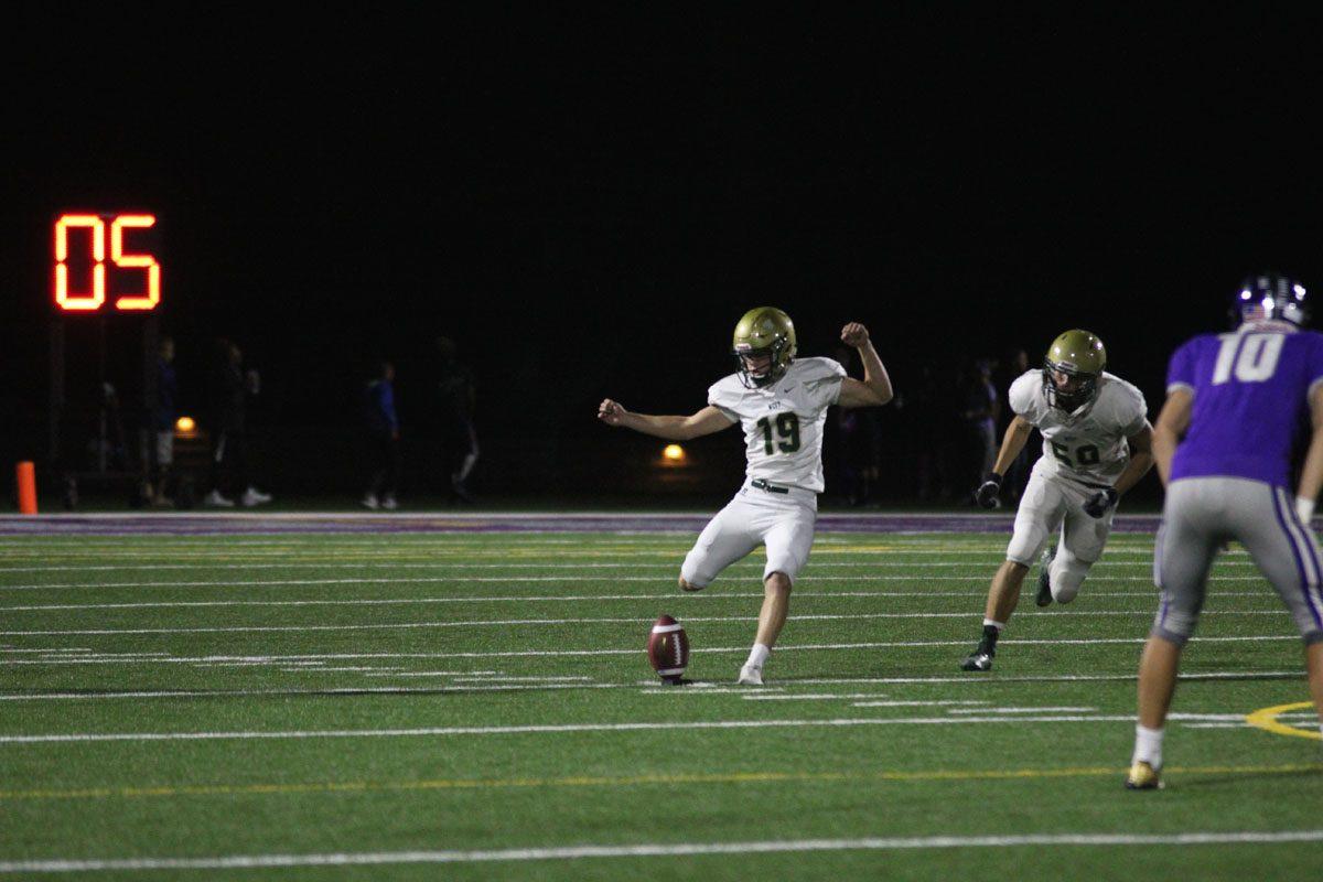 Lucas Karwal '18 kicks the ball after West scored the first touchdown of the game on Friday, Sept. 29.