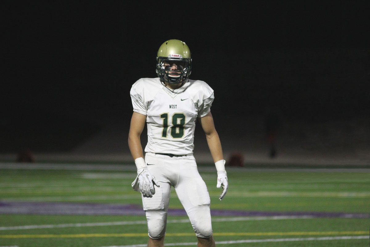 Cole Mabry '19 gets ready to defend against Burlington on Friday, Sept. 29. 
Photographer note: this photo was photoshopped to remove a player blocking the lens.