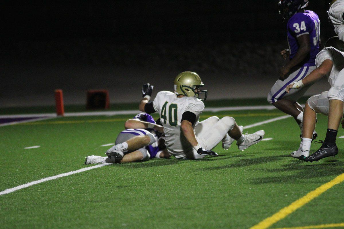 Dillon Shephard '18 celebrates after he sacks Burlington's quarterback on Friday, Sep. 29.