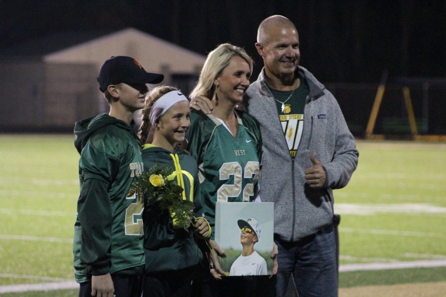 The Schroeder family honors Austin "Flash" Schroeder during the senior recognition on Friday, Oct. 13.