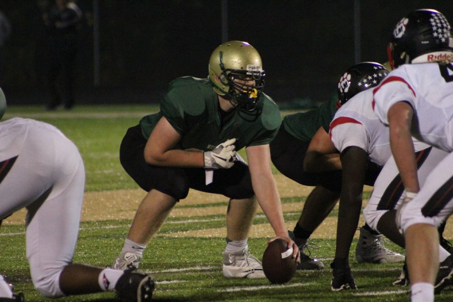 Marshall Blatz '19 sets up to hike the ball to Evan Flitz '18 on Friday, Oct. 13.