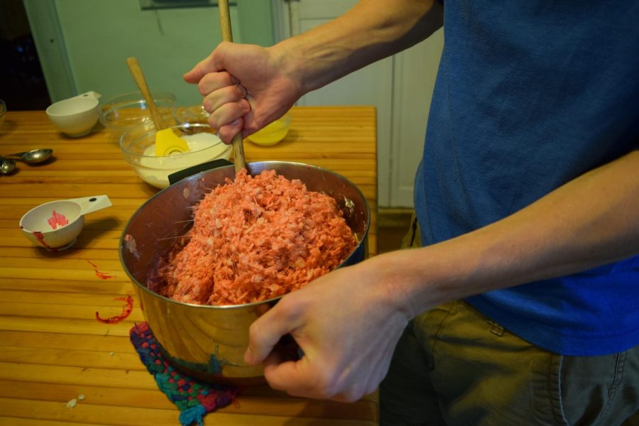 Rice krispies are added and mixed. Mixing takes a long time since the mallow mixture hardens.