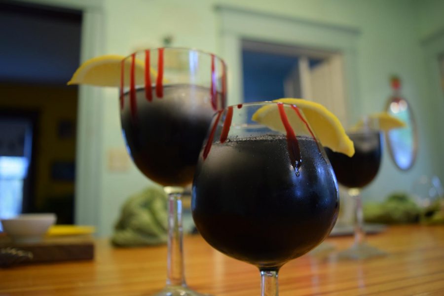 Red food coloring is placed on the edges of the glass for a bloody effect.