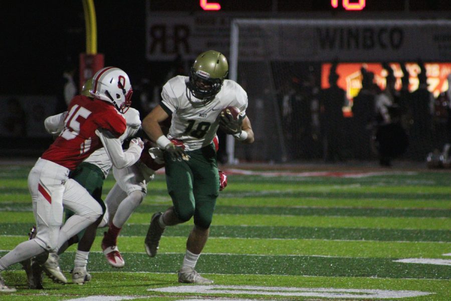 Cole Mabry '18 returns a punt from Ottumwa on Friday, Oct. 20.