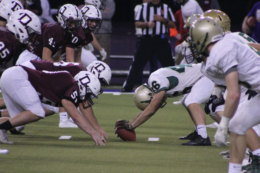 Justin Thomas '19 gets ready to hike the ball back to Marcus Morgan '21 for a punt on Friday, Nov. 17.