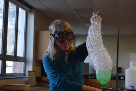 Wikner pulls bubbles during one of her many lab demos for students. 