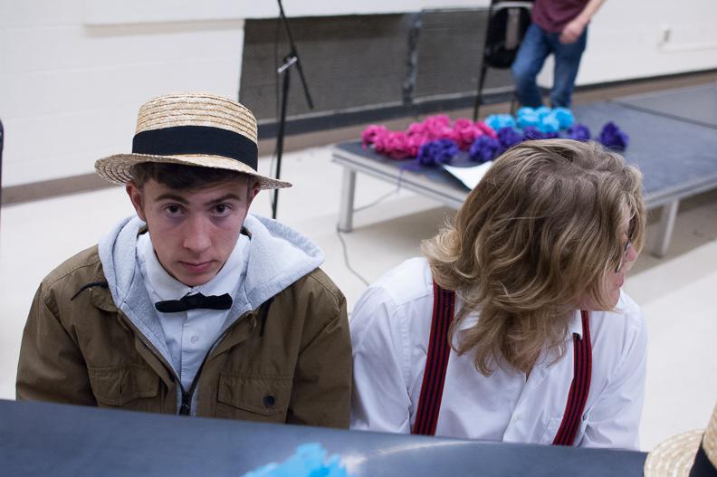 Performers Zach Ring 18 and Will Laverman 18 play the piano after the Girl Up fundraiser on Dec. 8 in the cafeteria. 