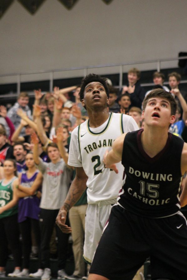 Paul McGee '18 watches as a free throw goes through the basket on Thursday, Nov. 30.