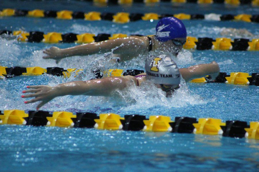 Ruby Martin 18 swims the 200 fly finals. She finished with a time of 1:56.05 on Saturday, Dec. 9.