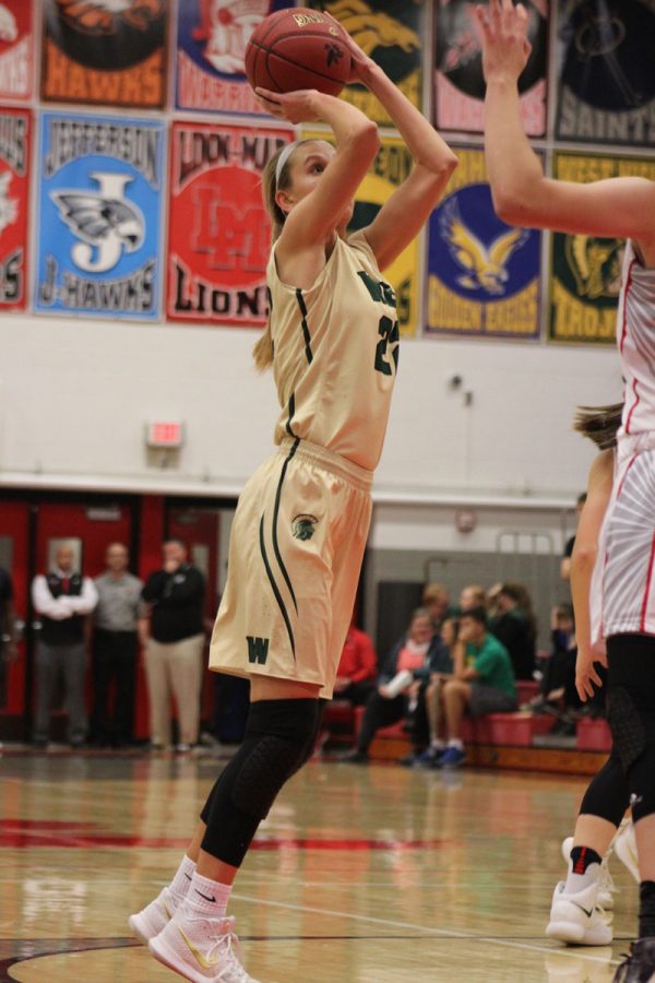 Logan Cook '18 shoots a two pointer for West on Tuesday, Dec. 12.