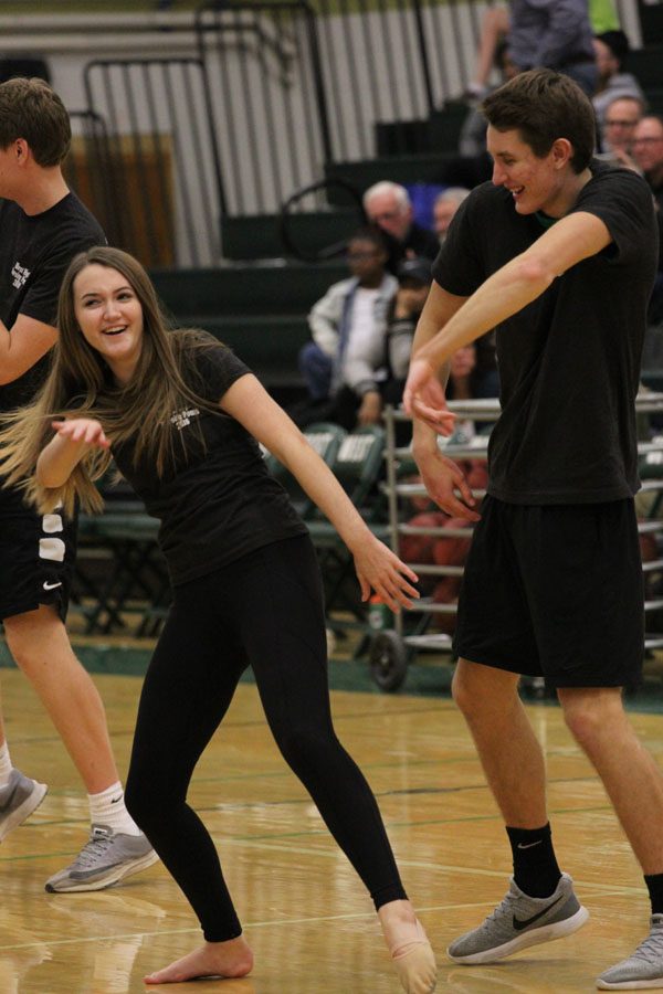 Maddy Epping '20 dances during the West High Varsity Poms annual guy-girl dance with Kobe Burns '18 on Tuesday, Jan. 23.