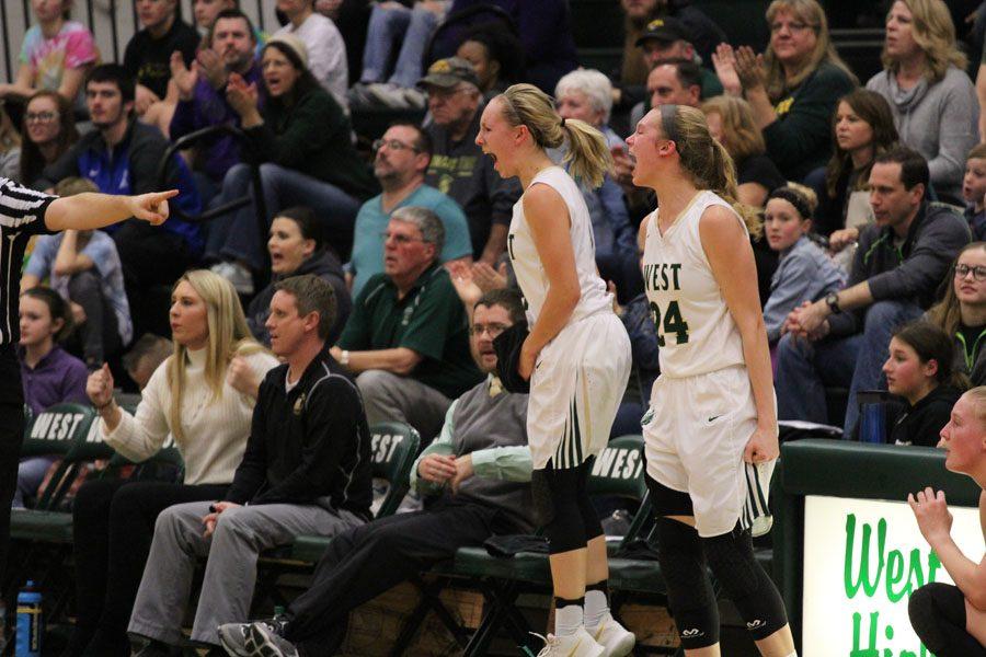 Lauren Zacharias ‘19 and Emma Koch '19 react as West gets the ball back during the second quarter on Friday, Jan. 26.