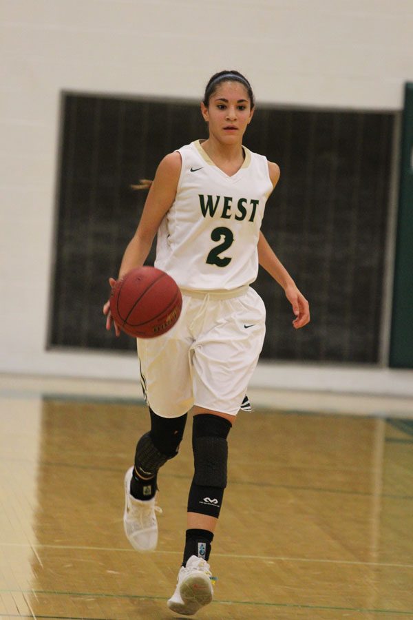 Cailyn Morgan ‘19 brings the ball down during the second half of the game on Friday, Jan. 26.