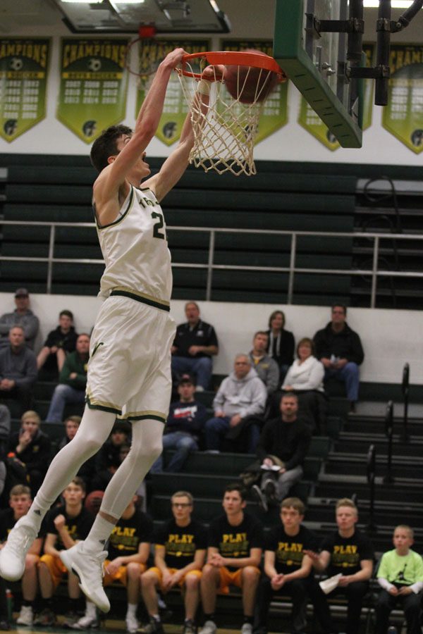 Patrick McCaffery '19 dunks the ball during the first quarter on Tuesday, Jan. 30.