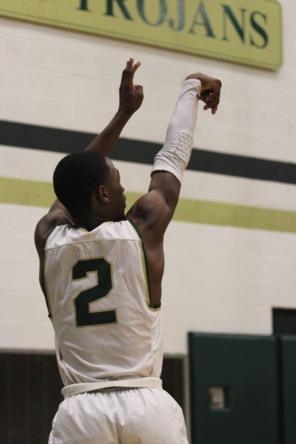 Dante Eldridge '19 shoots a basket for West on Tuesday, Jan. 30.