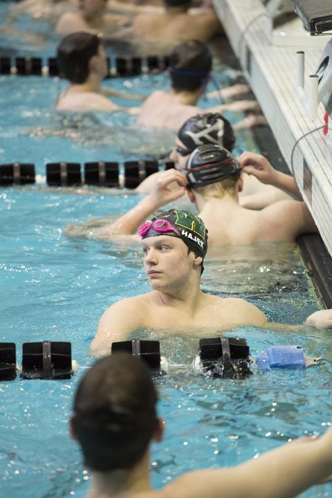 Izaak Hajek '20 looks around during warmups before the meet on Sat., Feb. 10.