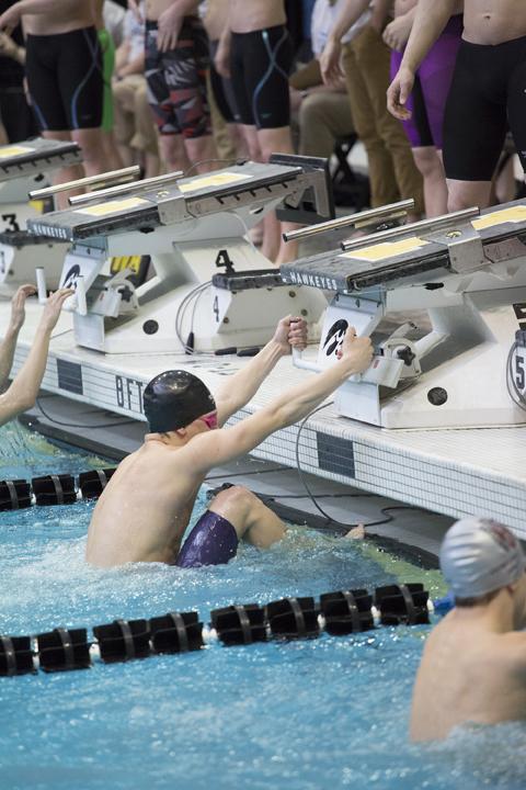 Izaak Hajek '20 waits for the start bell to begin the 100 medley relay. West placed 10th overall with a time of 1:37.83 on Saturday, Feb. 10. 