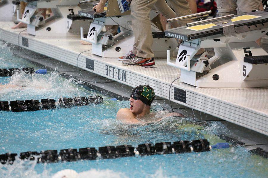 Brennon Keen '18 finishes the 200 free relay and looks up at the scoreboard to see his time. West placed 8th with a time of 1:27.76 on Sat., Feb. 10.