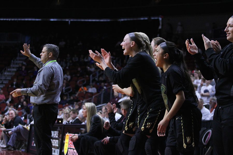 The team celebrates during the fourth quarter of the game on Monday, Feb. 26.