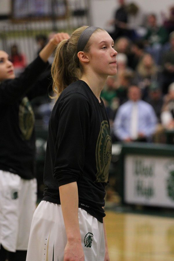 Emma Koch '19 prepares for the game during warmups on Friday, Feb. 9.