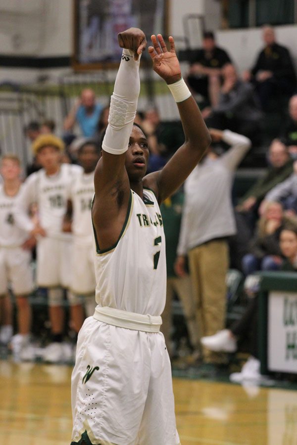 Dante Eldridge '19 shoots two free throws at the end of the first quarter on Saturday, Feb. 17.