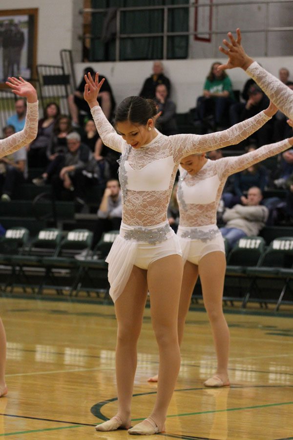 Liz Nodia '19 preforms during the Varsity Poms halftime dance on Saturday, Feb. 17.