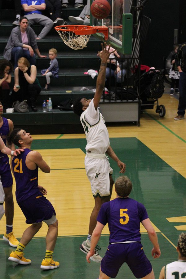 Paul McGee '18 goes up for a layup adding two points to West's score in the second half on Saturday, Feb. 17.