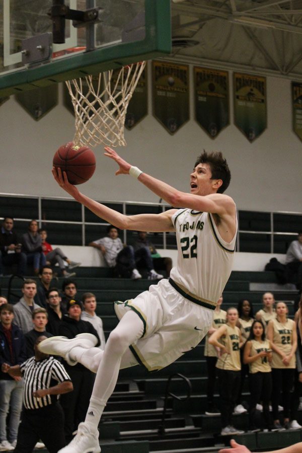 Patrick McCaffery '19 makes a basket after he stole the ball during the first half on Friday, Feb. 23.