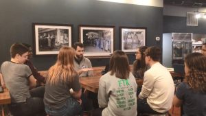 West high students talk with Zach Wahls at the Mormon Trek Java House on Feb. 19.