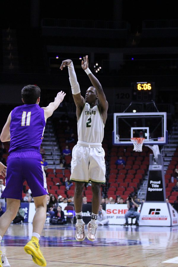 Dante Eldridge '19 makes a three-pointer during the first half of the game on Thursday, March 8.