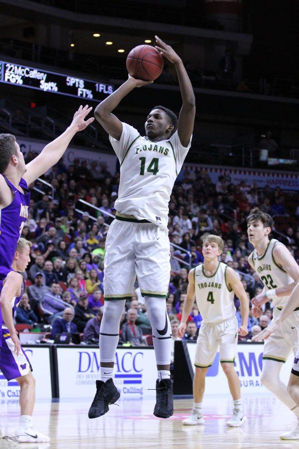 Hakeem Odunsi '18 goes up for two points during the second half on Thursday, March 8.