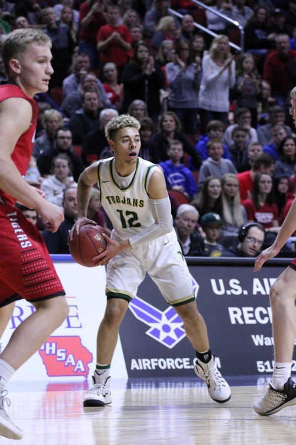 Jake Anderson '18 looks for a pass during the first half of the game on Friday, March 9.