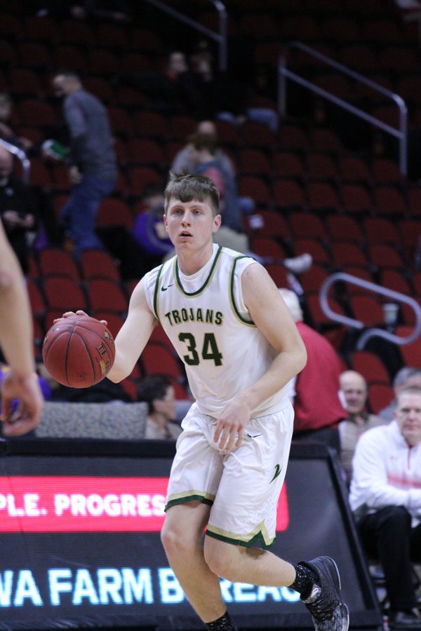 Jayson Barnes '18 brings the ball down the court during the second half of the game on Friday, March 9.