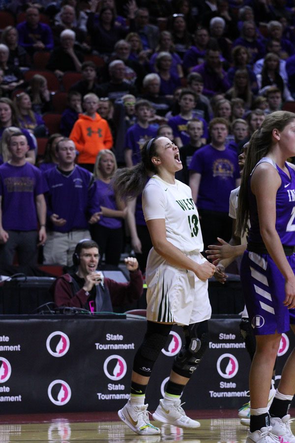 Rachael Saunders '18 celebrates after she scored a basket and got fouled on Thursday, March 1.