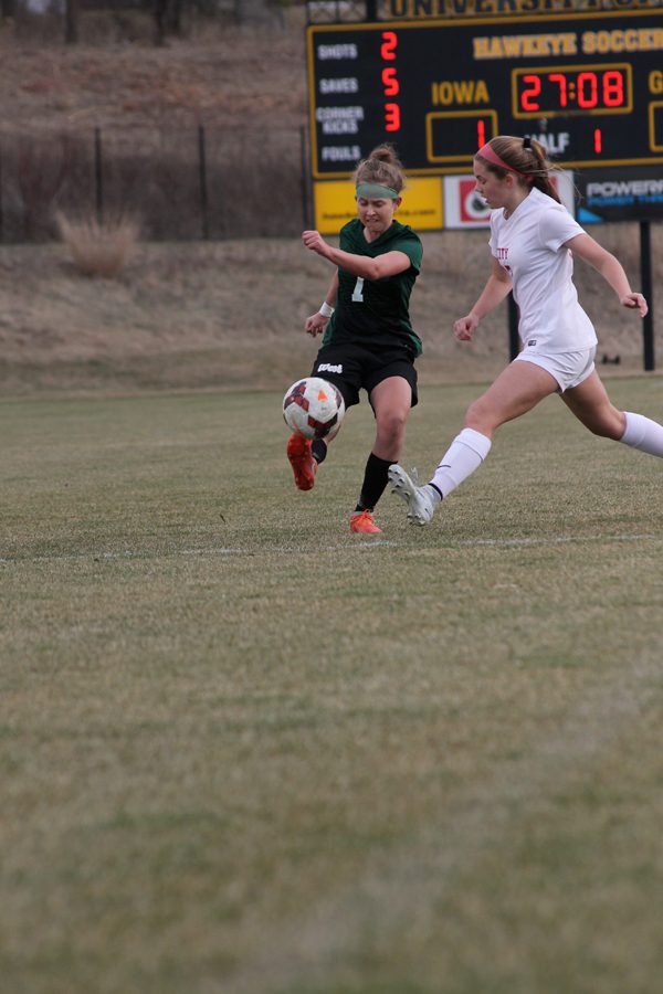 Carlin Morsch 18 kicks the ball up during the second half of the game on Friday, April 20.