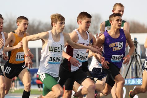 Kolby Greiner 19 makes his way to the front of the pack during the boys 3,200 meter race on Thursday, April 26.