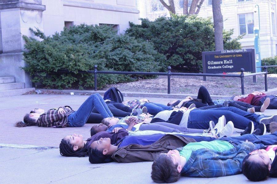 A couple dozen protesters showed up to participate in the die-in on Friday, April 20. 