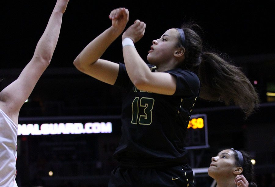 Rachael Saunders '18 goes up for a jump shot during the state championship game on Friday, March 2.