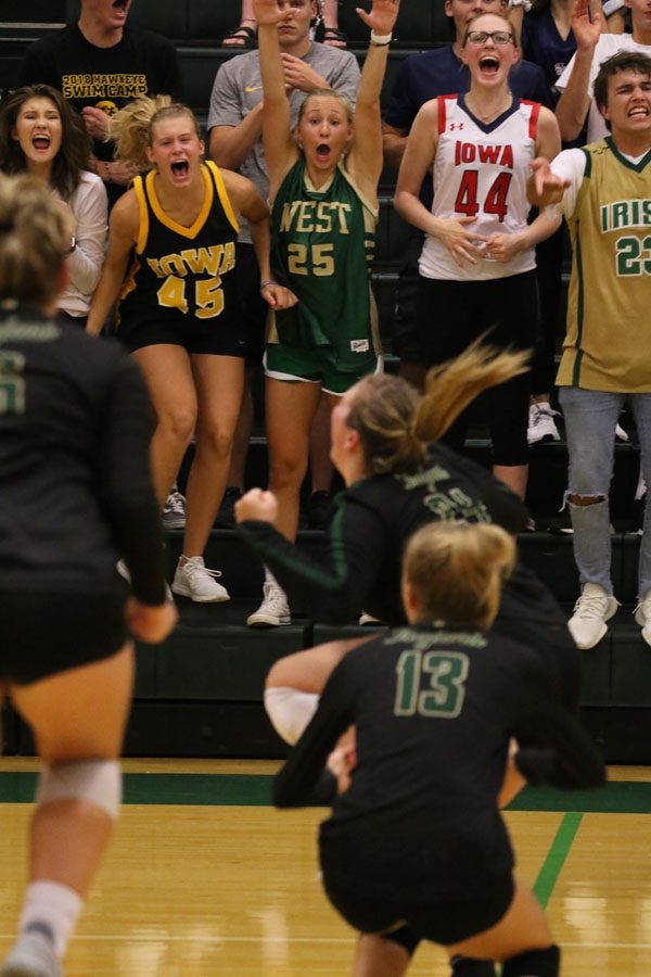 The student section cheers as West makes the score 22-20 during the final set on Tuesday, Aug. 28.