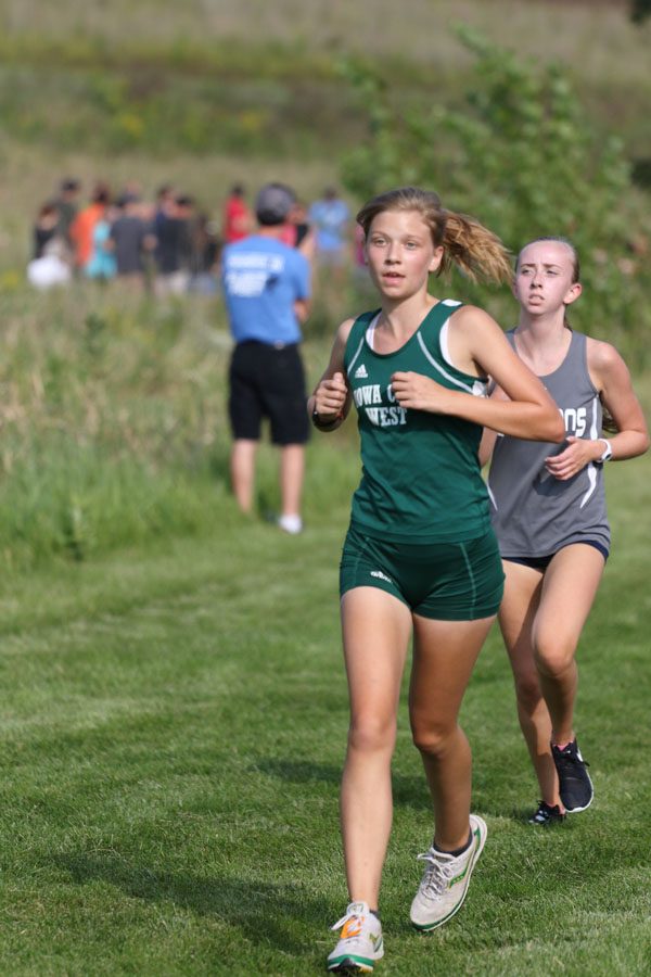 Annabel Hendrickson ’21 paces herself during the first mile of the JV race on Thursday, Aug. 23. She placed 7th in 23:34.