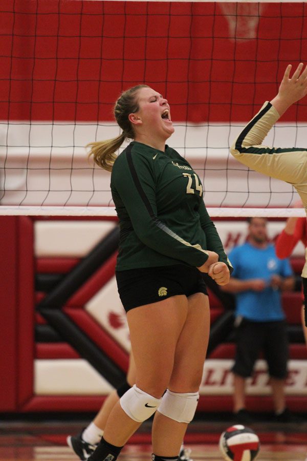 Haley Gallagher '19 celebrates after she spiked the ball during the first set on Tuesday, Aug. 21.