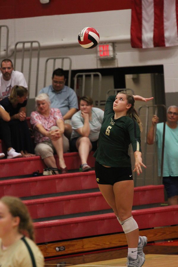 Rylee Fay '20 serves the ball during the fourth and final set of the match on Tuesday, Aug. 21.