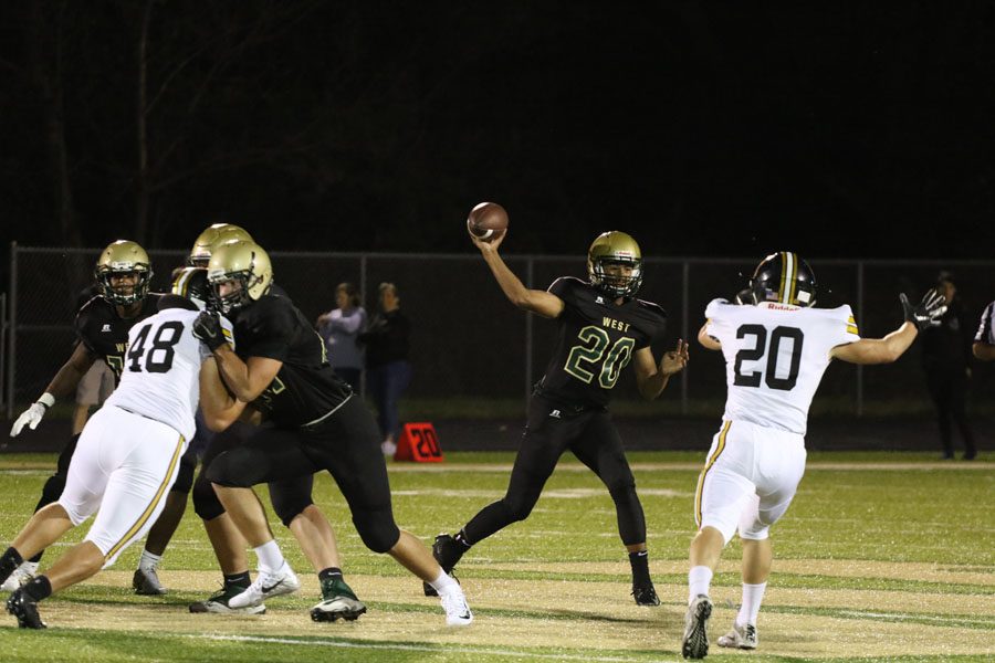 Marcus Morgan '21 passes the ball up the field during the first half on Friday, Sept. 7. This was Morgan's first career start as quarterback.