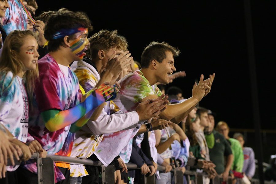 Zach Albright '19 cheers as the drum line plays during halftime on Friday, Sept. 7.