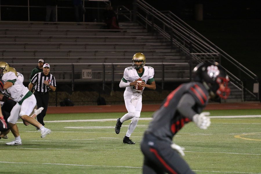 Marcus Morgan '21 searches for someone to pass to during the first half on Friday, Sept. 28.